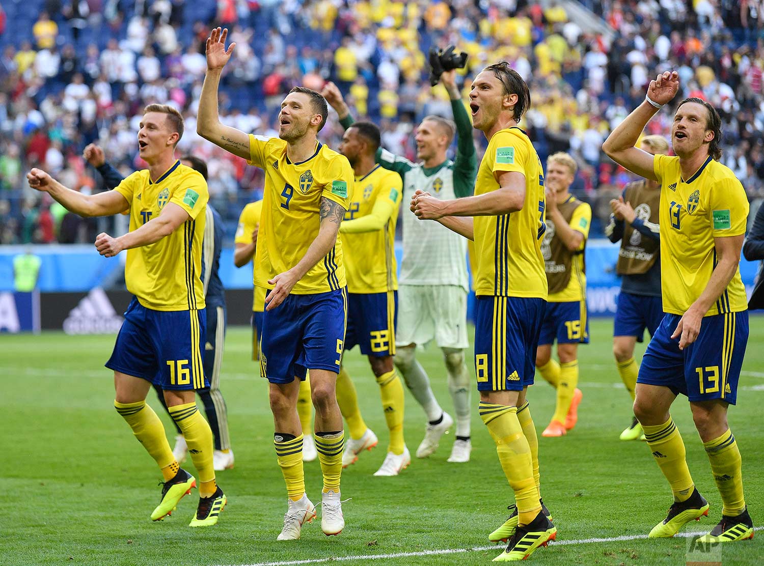  Sweden teammates celebrate after winning the round of 16 match between Switzerland and Sweden at the 2018 soccer World Cup in the St. Petersburg Stadium, in St. Petersburg, Russia, Tuesday, July 3, 2018. (AP Photo/Martin Meissner) 