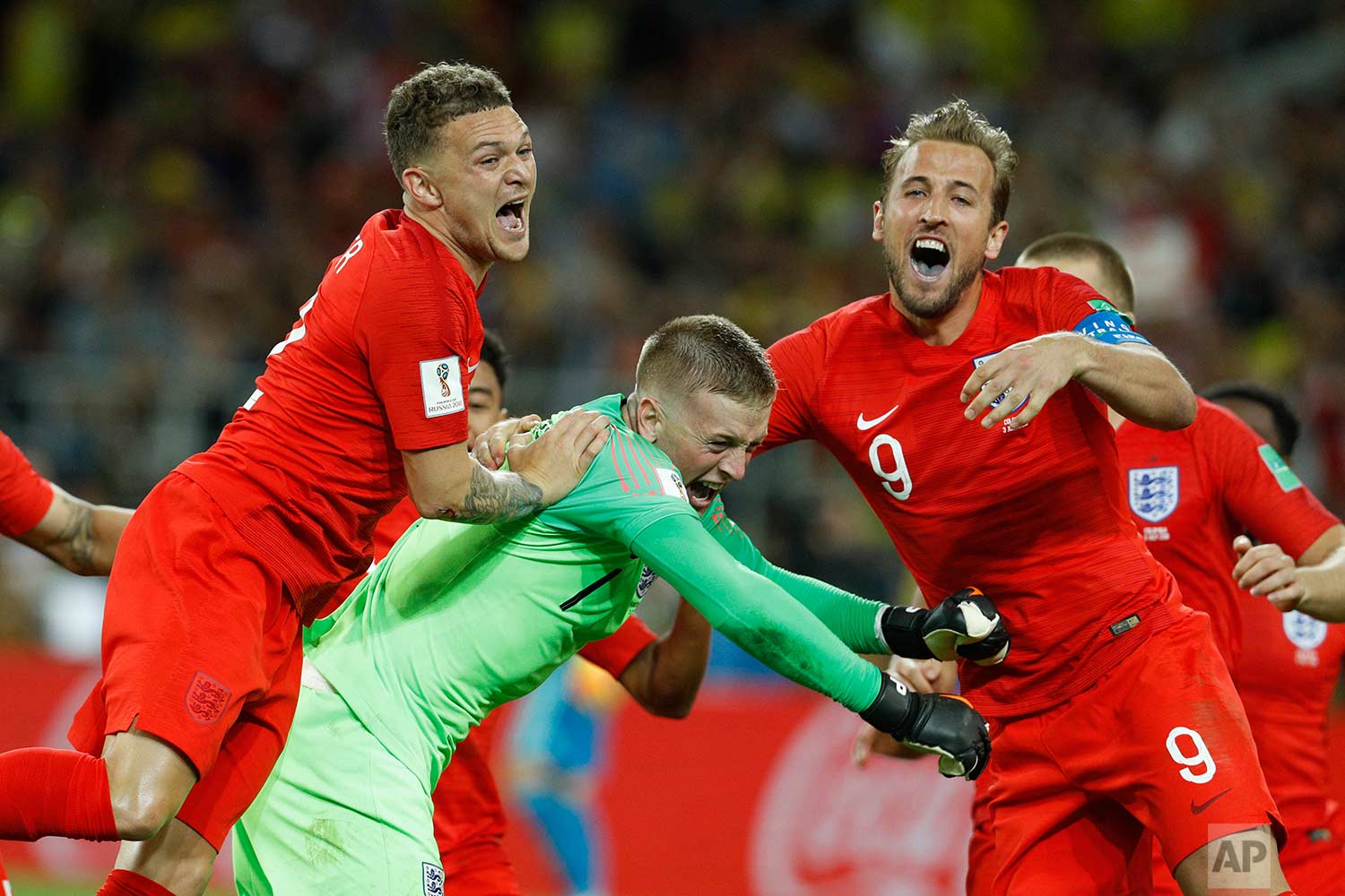  England's Harry Kane, right, goalkeeper Jordan Pickford, centre, and Kieran Trippier celebrate at the end of the round of 16 match between Colombia and England at the 2018 soccer World Cup in the Spartak Stadium, in Moscow, Russia, Tuesday, July 3, 