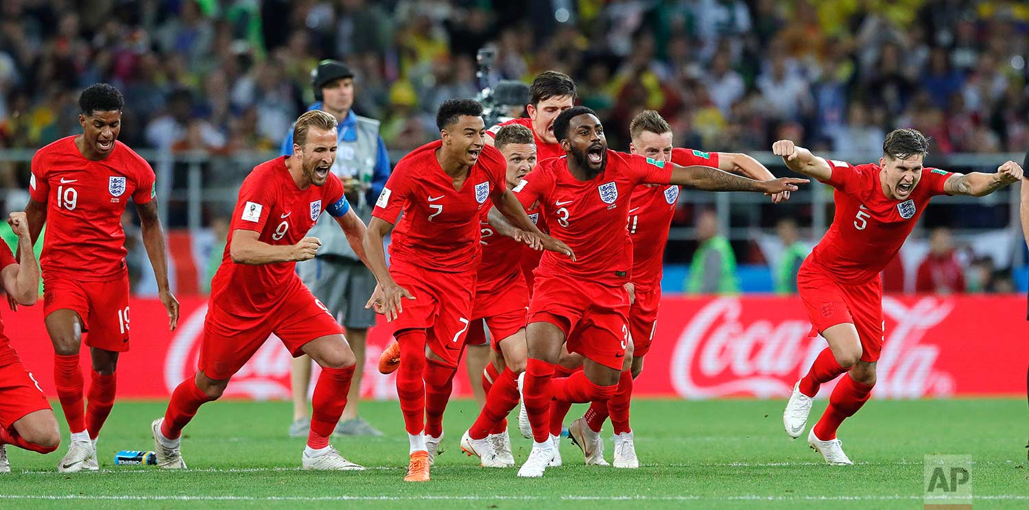 England's players celebrate after defeated Colombia in a penalty shoot out during the round of 16 match between Colombia and England at the 2018 soccer World Cup in the Spartak Stadium, in Moscow, Russia, Tuesday, July 3, 2018. (AP Photo/Ricardo Mazalan)