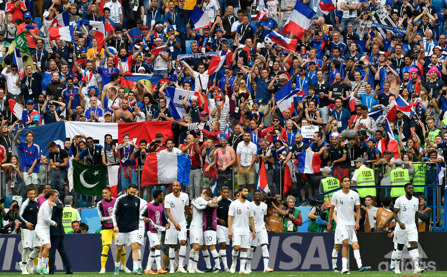  France players and supporters celebrate after the quarterfinal match between Uruguay and France at the 2018 soccer World Cup in the Nizhny Novgorod Stadium, in Nizhny Novgorod, Russia, Friday, July 6, 2018. (AP Photo/Martin Meissner) 