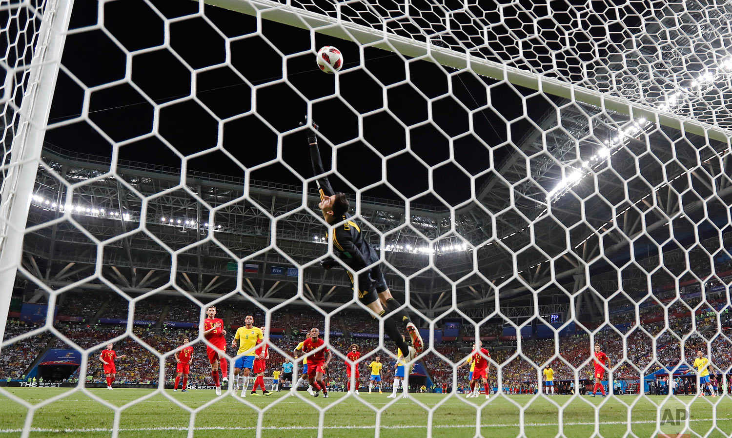  Belgium goalkeeper Thibaut Courtois saves from Brazil's Neymar during the quarterfinal match between Brazil and Belgium at the 2018 soccer World Cup in the Kazan Arena, in Kazan, Russia, Friday, July 6, 2018. (AP Photo/Frank Augstein) 