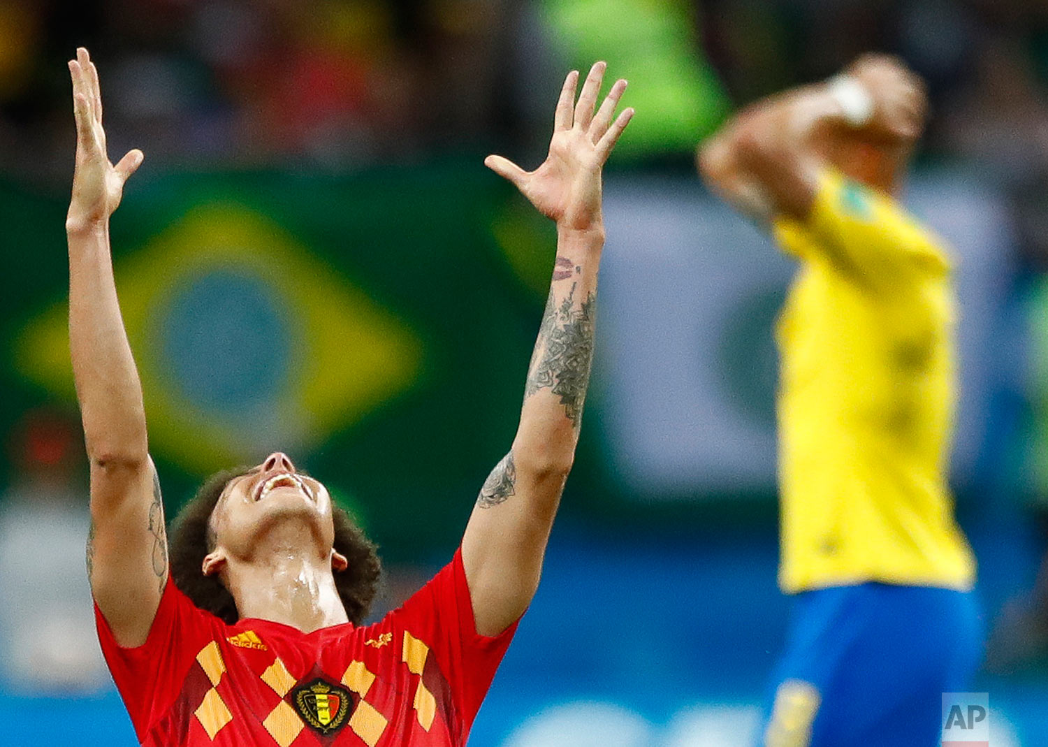  Belgium's Axel Witsel, centre celebrates after the final whistle as Belgium defeat Brazil in their quarterfinal match between Brazil and Belgium at the 2018 soccer World Cup in the Kazan Arena, in Kazan, Russia, Friday, July 6, 2018. Belgium won the