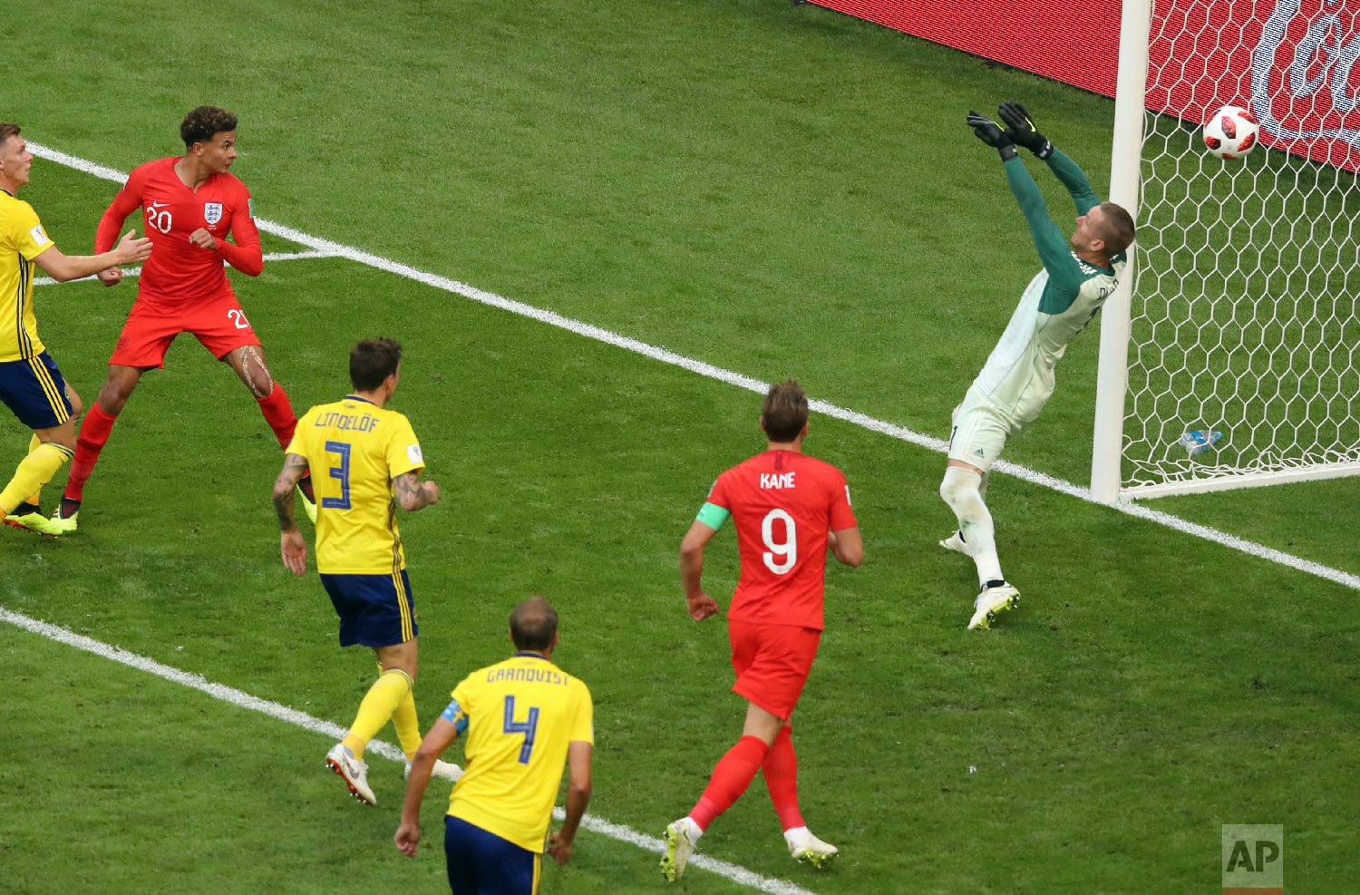  England's Dele Alli, 2nd left, scores his side's second goal during the quarterfinal match between Sweden and England at the 2018 soccer World Cup in the Samara Arena, in Samara, Russia, Saturday, July 7, 2018. (AP Photo/Thanassis Stavrakis) 