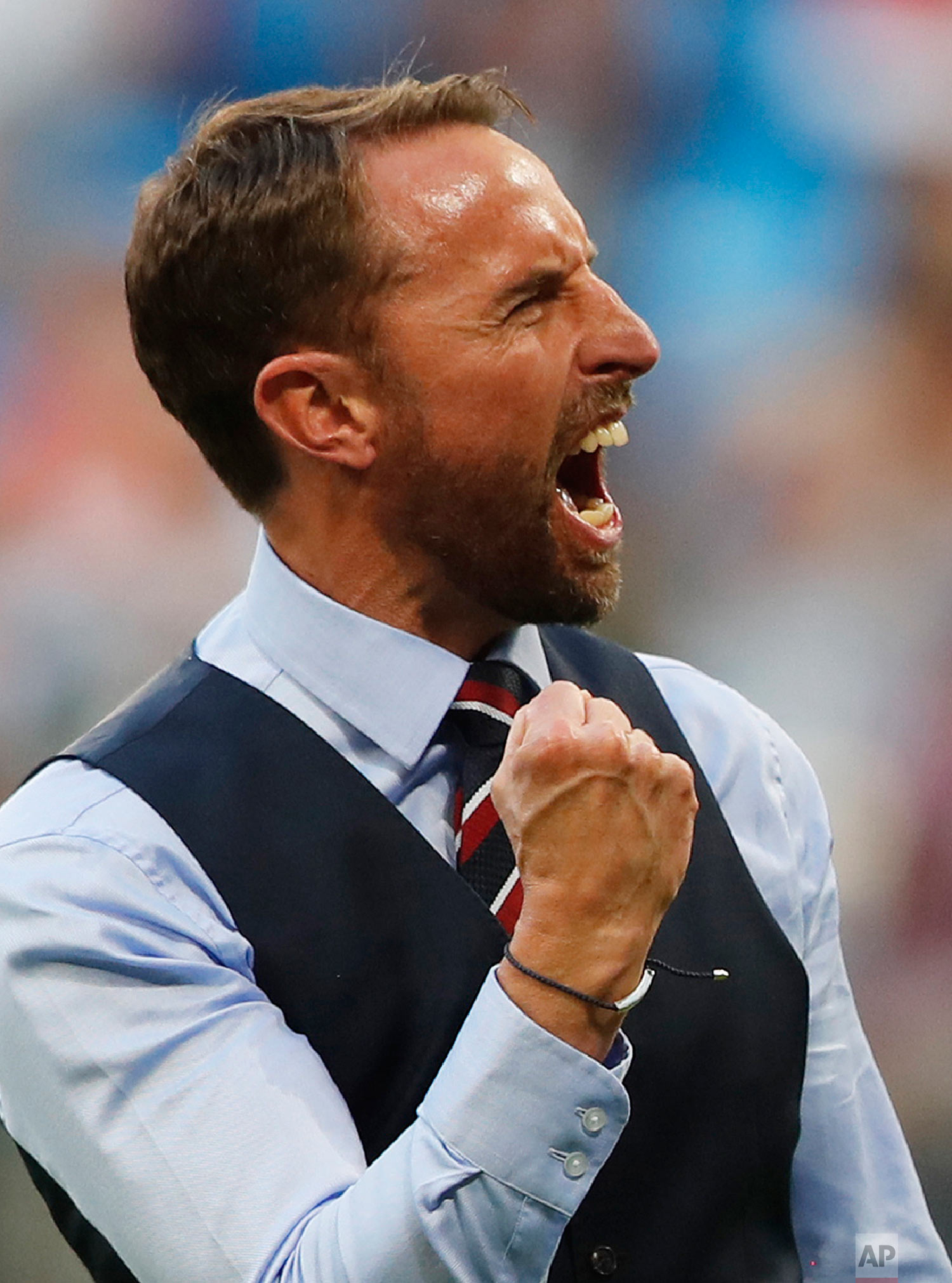  England head coach Gareth Southgate celebrates victory of his team over Sweden during the quarterfinal match between Sweden and England at the 2018 soccer World Cup in the Samara Arena, in Samara, Russia, Saturday, July 7, 2018. (AP Photo/Frank Augs