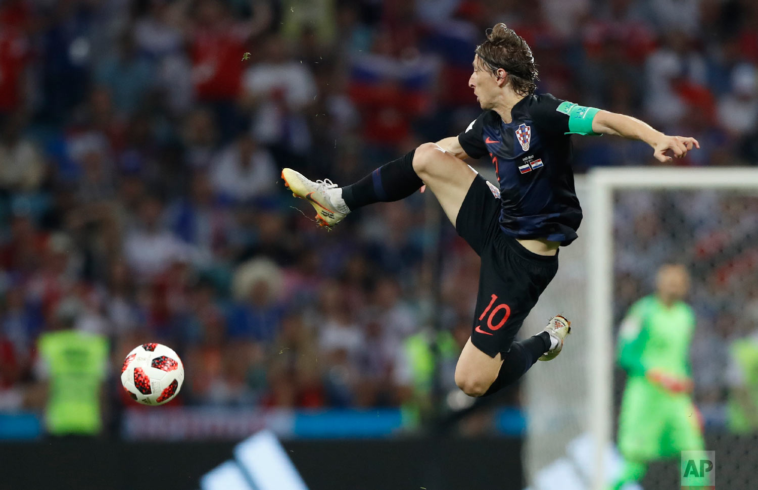  Croatia's Luka Modric jumps for the ball during the quarterfinal match between Russia and Croatia at the 2018 soccer World Cup in the Fisht Stadium, in Sochi, Russia, Saturday, July 7, 2018. (AP Photo/Darko Bandic) 