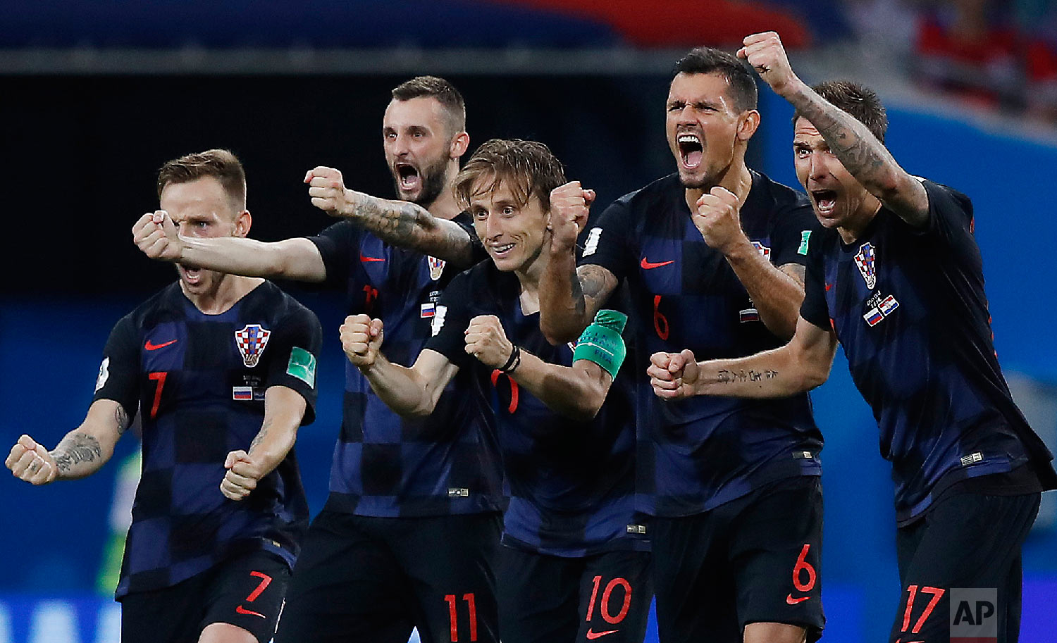  Croatia national soccer team players celebrate after a penalty is saved in a shootout during the quarterfinal match between Russia and Croatia at the 2018 soccer World Cup in the Fisht Stadium, in Sochi, Russia, Saturday, July 7, 2018. Croatia won t