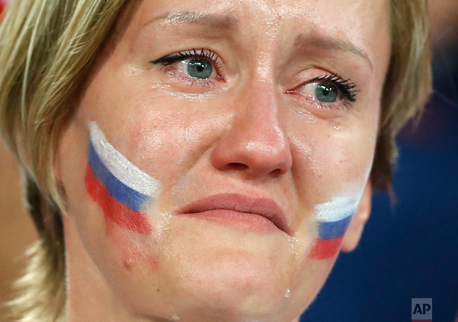  A Russia's fan cries after Russia's loss in the quarterfinal match between Russia and Croatia at the 2018 soccer World Cup in the Fisht Stadium, in Sochi, Russia, Saturday, July 7, 2018. (AP Photo/Darko Bandic) 