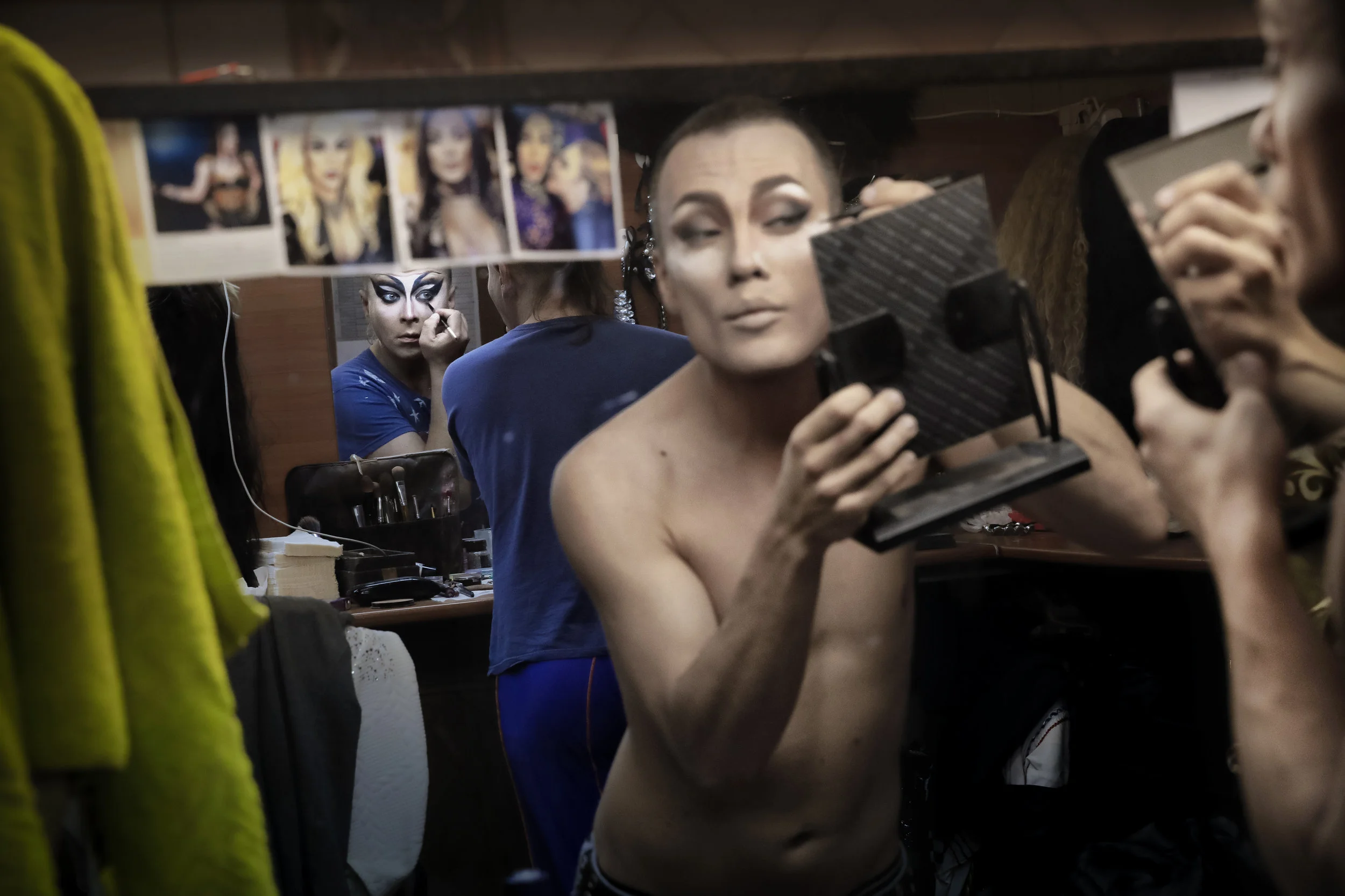 Sergey, left, who uses the stage name Bomba (the bomb), and Andrei, who goes by the name of Star Vasha apply make-up backstage before performing at the Fame gay club during the 2018 soccer World Cup in Yekaterinburg, Russia. (AP Photo/Vadim Ghirda)