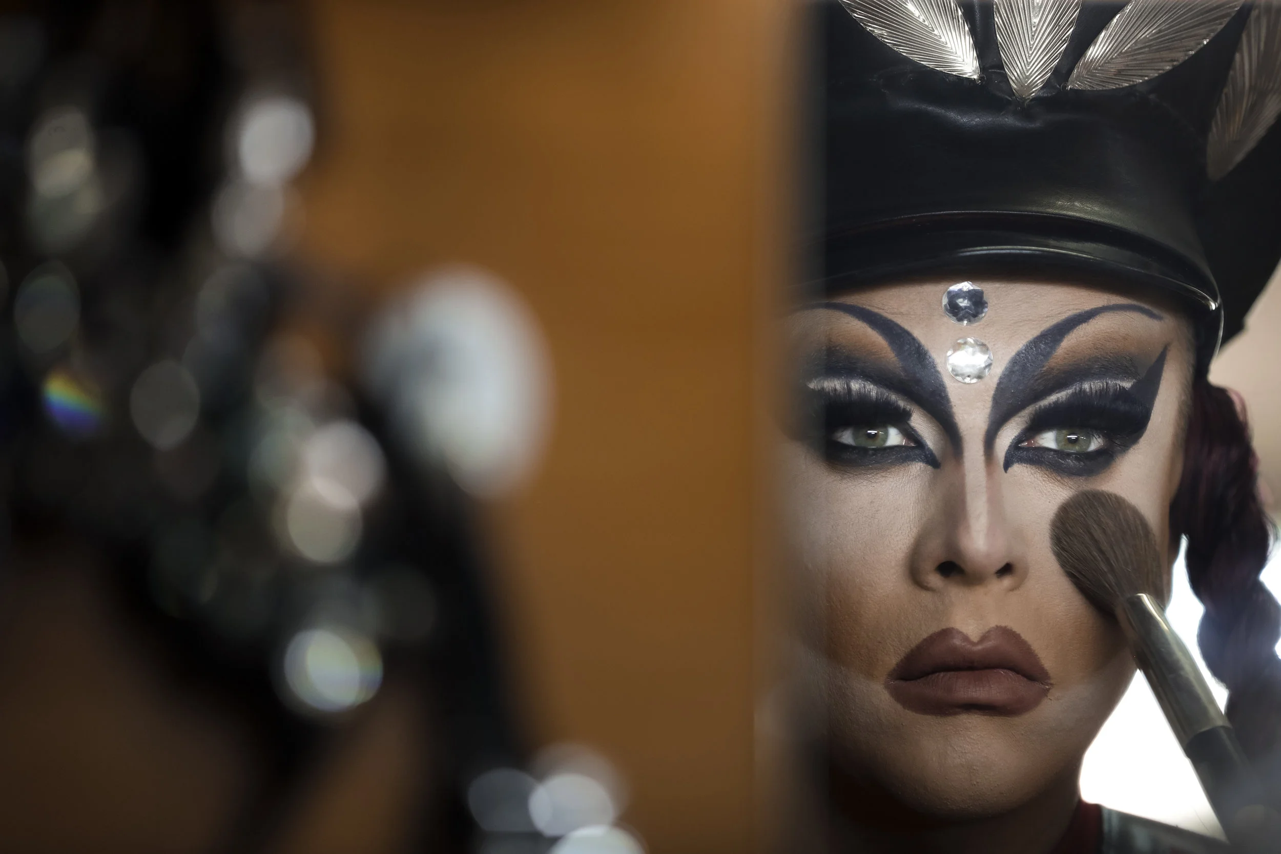 Sergey, who uses the stage name Bomba (the bomb) applies finishing touches to make-up at the Fame gay club, during the 2018 soccer World Cup in Yekaterinburg, Russia. (AP Photo/Natacha Pisarenko)