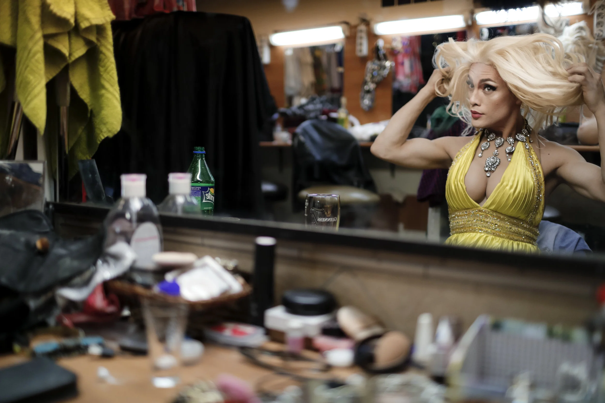 Andrei, who uses the stage name Star Vasha, checks a wig at the Fame gay club, during the 2018 soccer World Cup in Yekaterinburg, Russia on Sunday, June 24, 2018 (AP Photo/Natacha Pisarenko)