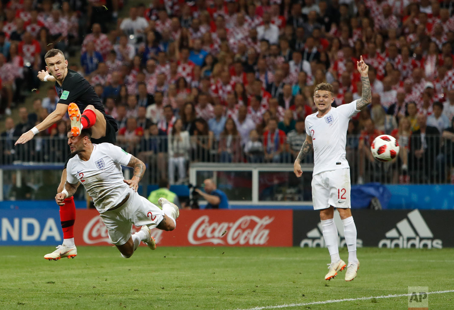  Croatia's Ivan Perisic scores his side's opening goal during the semifinal match between Croatia and England at the 2018 soccer World Cup in the Luzhniki Stadium in, Moscow, Russia, Wednesday, July 11, 2018. (AP Photo/Alastair Grant) 