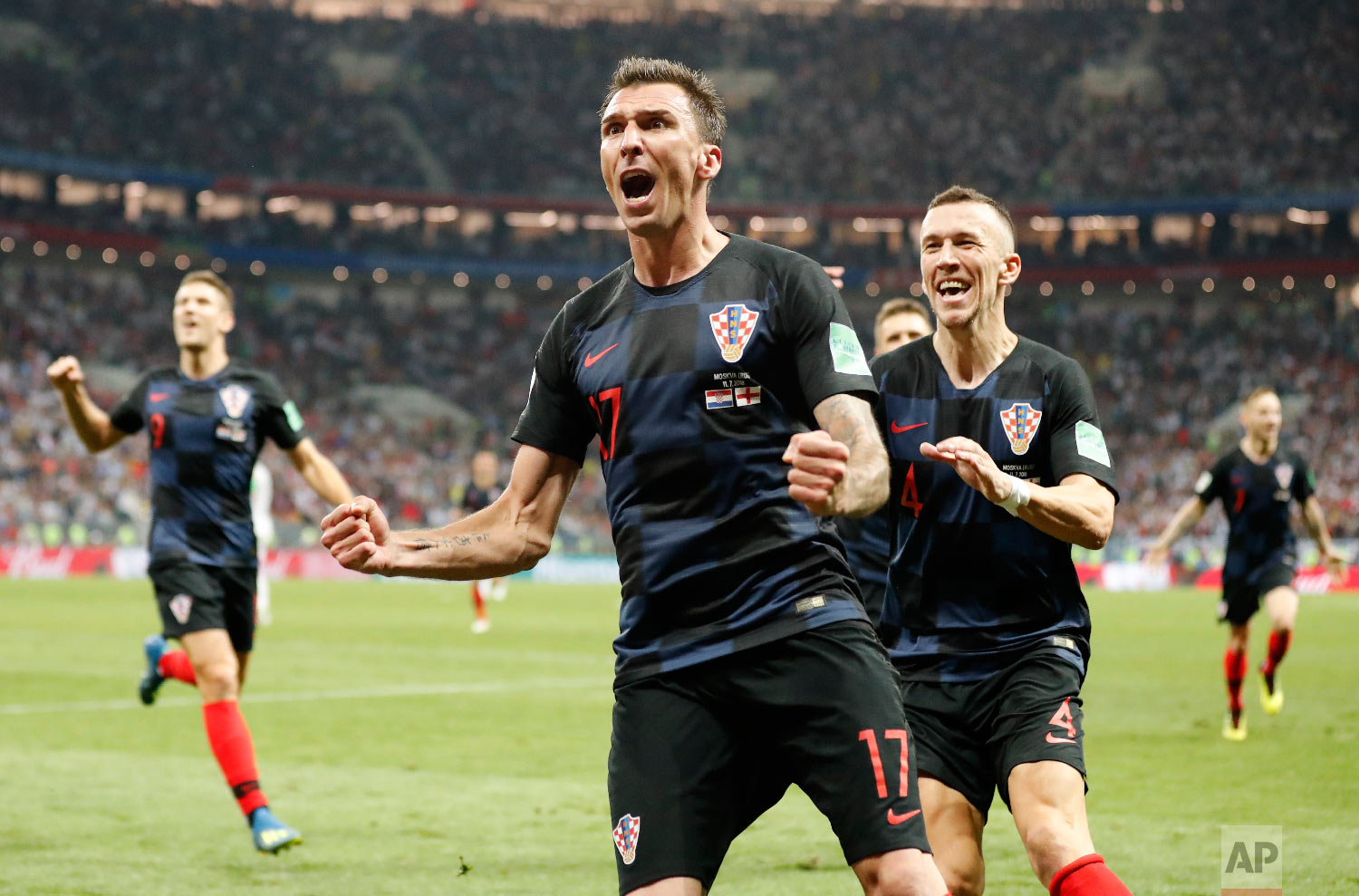  Croatia's Mario Mandzukic celebrates after scoring his side's second goal during the semifinal match between Croatia and England at the 2018 soccer World Cup in the Luzhniki Stadium in Moscow, Russia, Wednesday, July 11, 2018. (AP Photo/Frank Augste