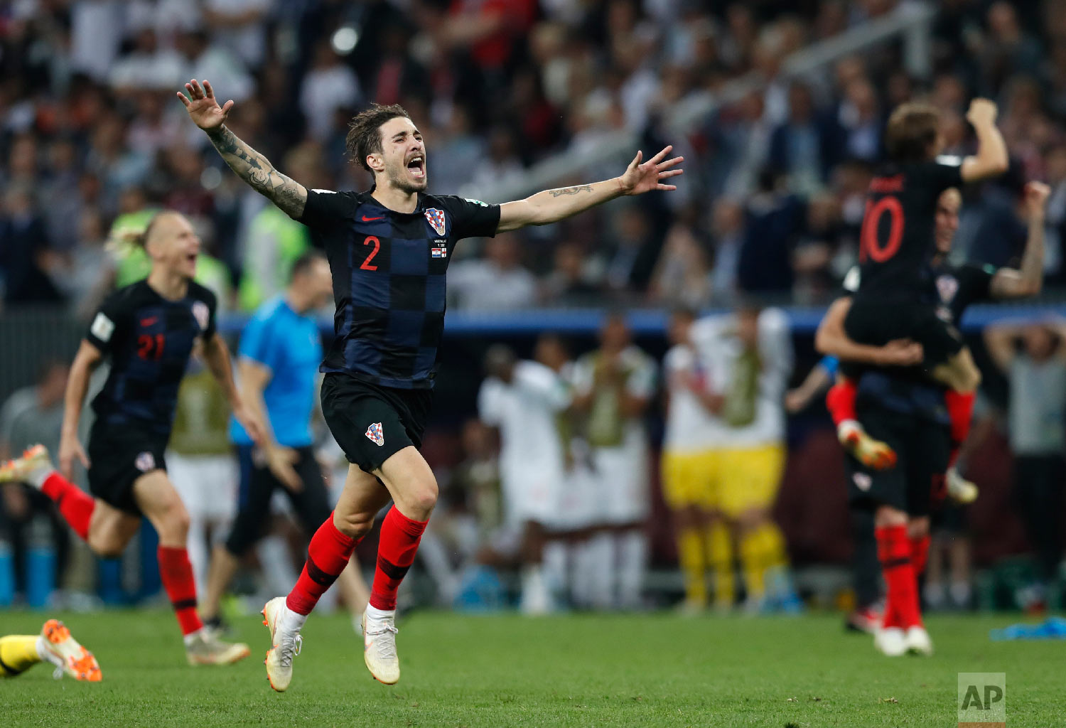  Croatia's Sime Vrsaljko celebrates after his team advanced to the final during the semifinal match between Croatia and England at the 2018 soccer World Cup in the Luzhniki Stadium in Moscow, Russia, Wednesday, July 11, 2018. (AP Photo/Alastair Grant