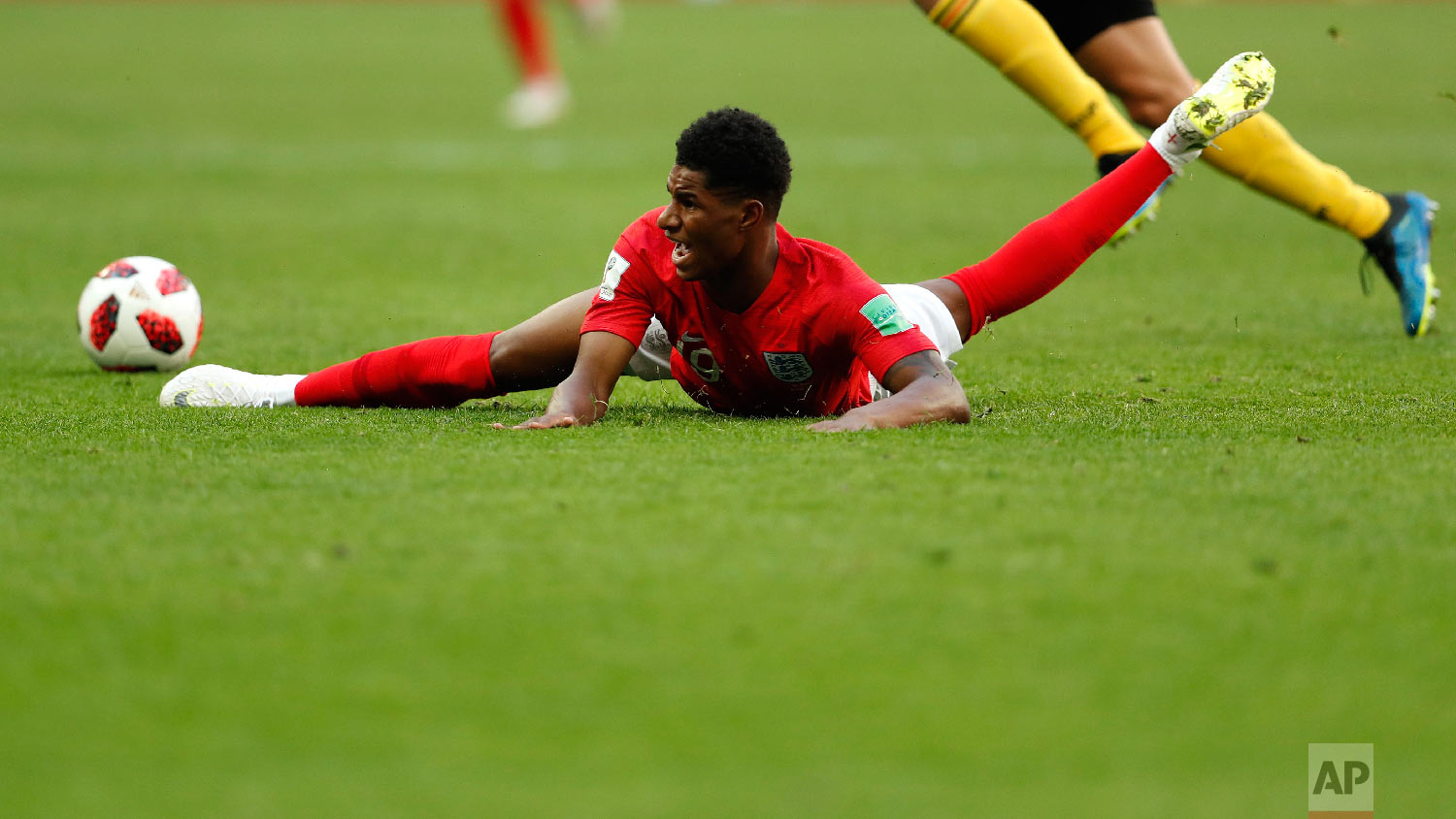  England's Marcus Rashford lies on the ground during the third place match between England and Belgium at the 2018 soccer World Cup in the St. Petersburg Stadium in St. Petersburg, Russia, Saturday, July 14, 2018. (AP Photo/Natacha Pisarenko) 