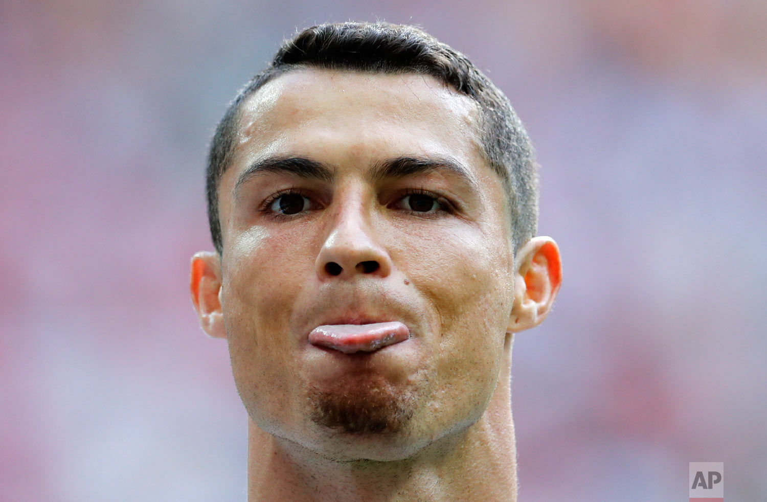  Portugal's Cristiano Ronaldo sticks out his tongue during the group B match between Portugal and Morocco at the 2018 soccer World Cup in the Luzhniki Stadium in Moscow, Russia on June 20, 2018. (AP Photo/Hassan Ammar) 