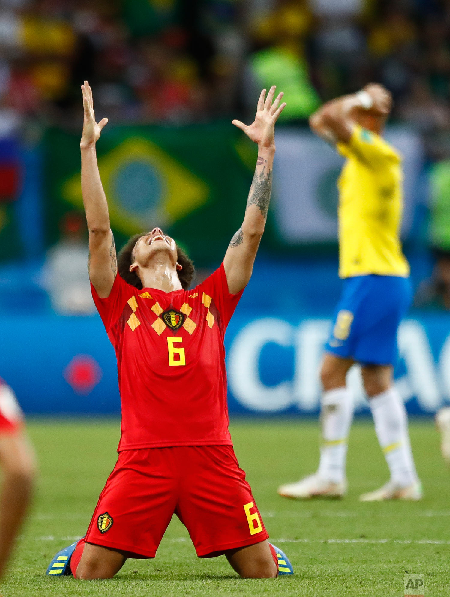 Belgium's Axel Witsel, centre celebrates after the final whistle as Belgium defeat Brazil in their quarterfinal match between Brazil and Belgium at the 2018 soccer World Cup in the Kazan Arena, in Kazan, Russia on July 6, 2018. (AP Photo/Matthias Schrader, File)