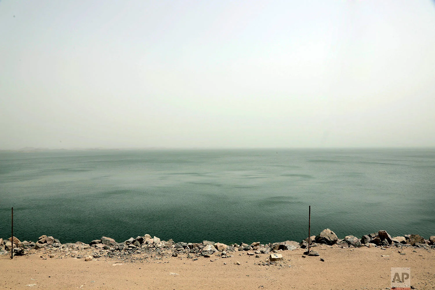 Lake Nasser, the other side of the high dam which flooded the Nubians' ancestral homeland in the1950s and 1960s, in Aswan, Egypt. (AP Photo/Nariman El-Mofty)