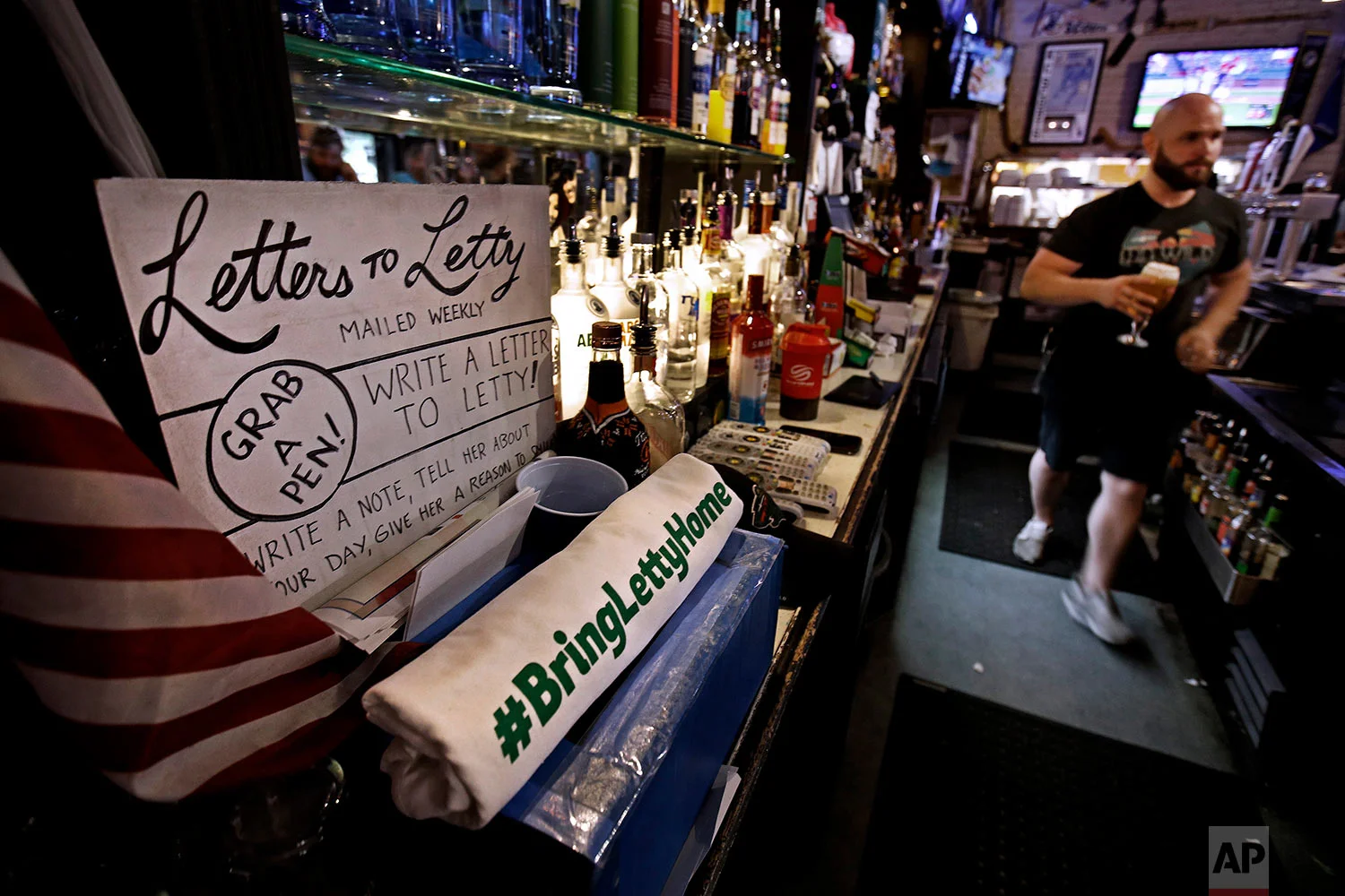 Customers are encouraged to write letters to Letty Stegall, the general manager of The Blue Line hockey bar in Kansas City, Mo. (AP Photo/Charlie Riedel) 