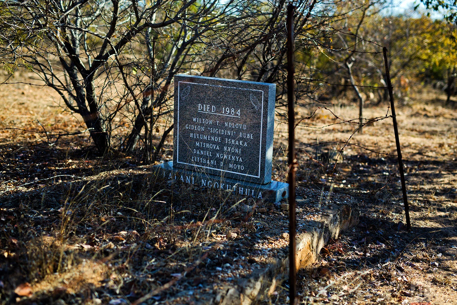 A mass grave bearing the names of six victims of the the Matabeleland Massacres, near the now abandoned Zimbabwean Sitezi military camp. (AP Photo/Jerome Delay)
