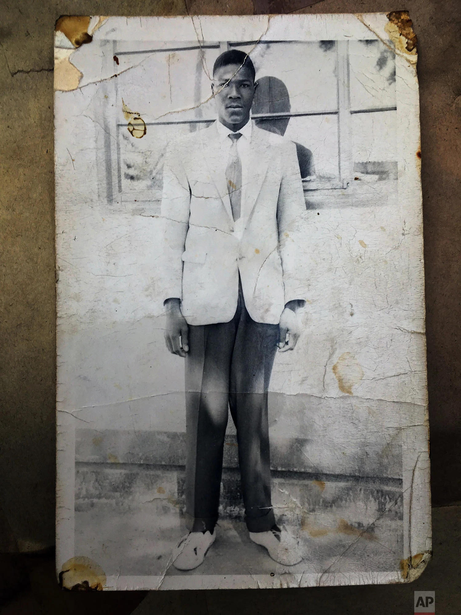 This photograph provided by the family shows Julius Mvulo Nyathi, before he was killed over 30 years ago by Zimbabwean soldiers during the Matabeleland Massacres. (AP Photo/Family of Julius Mvulo Nyathi)