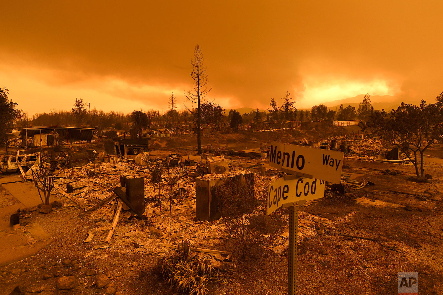  Homes leveled by the Carr Fire line the Lake Keswick Estates area of Redding, Calif., on Friday, July 27, 2018. (AP Photo/Noah Berger) 