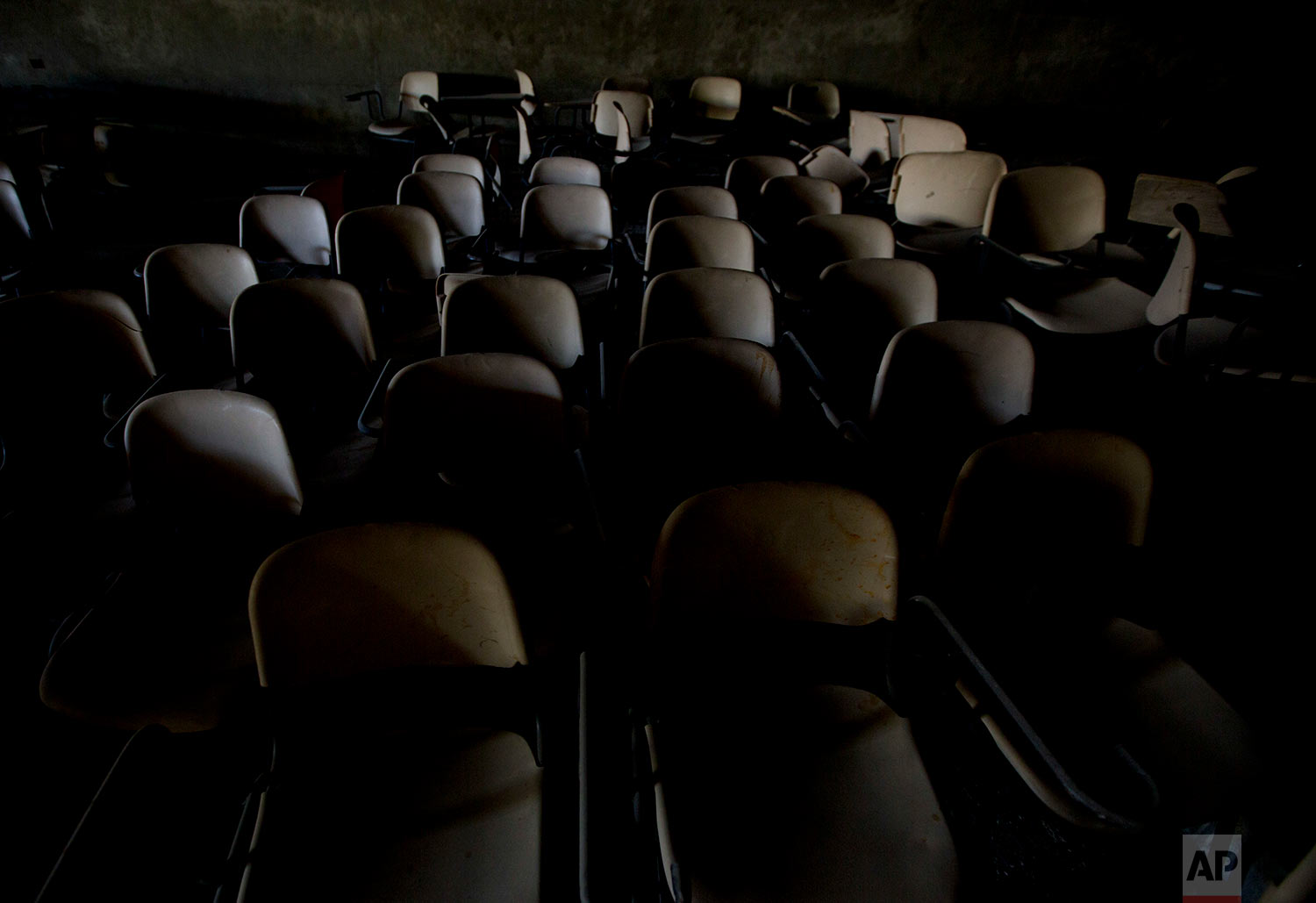  Stacked delegates' chairs are seen in an underground garage of what was to be a Palestinian parliament in Abu Dis, West Bank on  June 24, 2018. This decrepit building, built during the heyday of Israeli-Palestinian peace talks in the 1990s, was mean