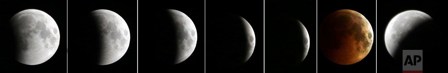  This combination of the seven photos shows the different stages of the moon, from left to right, as a complete lunar eclipse starts from late Friday, July 27, 2018 to early Saturday, July 28, 2018, seen from Kabul, Afghanistan. (AP Photo/Massoud Hos