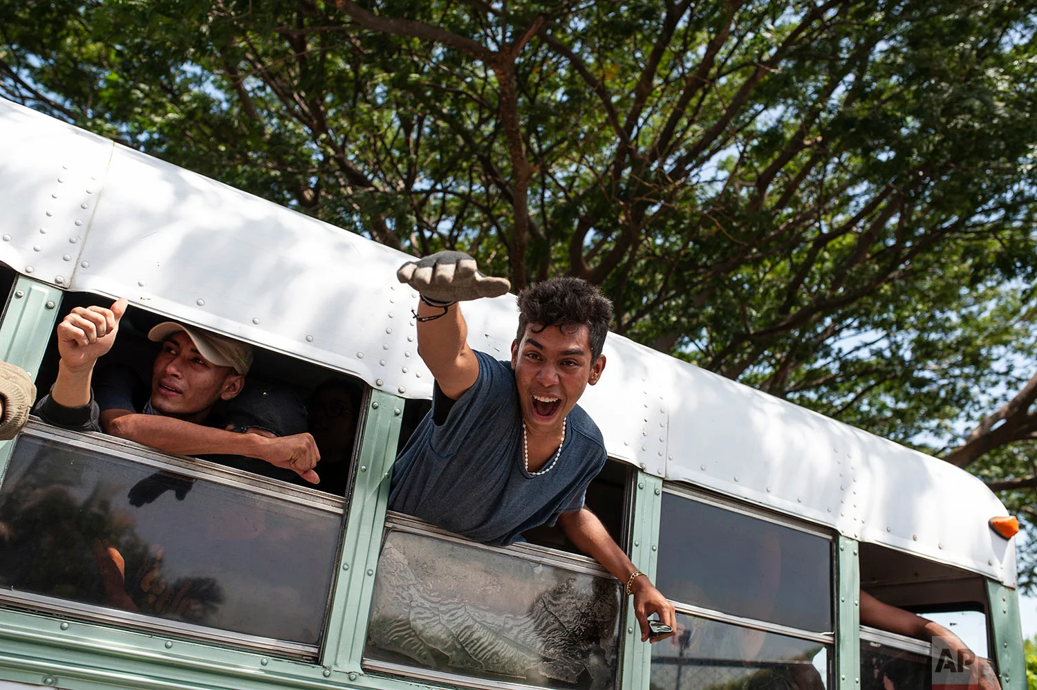 Students who had taken refuge in the Jesus of Divine Mercy church amid a barrage of armed attacks, arrive on a bus to the Cathedral in Managua, Nicaragua, July 14, 2018. Cardinal Leopoldo Brenes negotiated for the safe transfer of students who had sought refuge there when police forced them out of the National Autonomous University of Nicaragua, which had been occupied during two months of protests against the government of President Daniel Ortega. (AP Photo/Cristobal Venegas)
