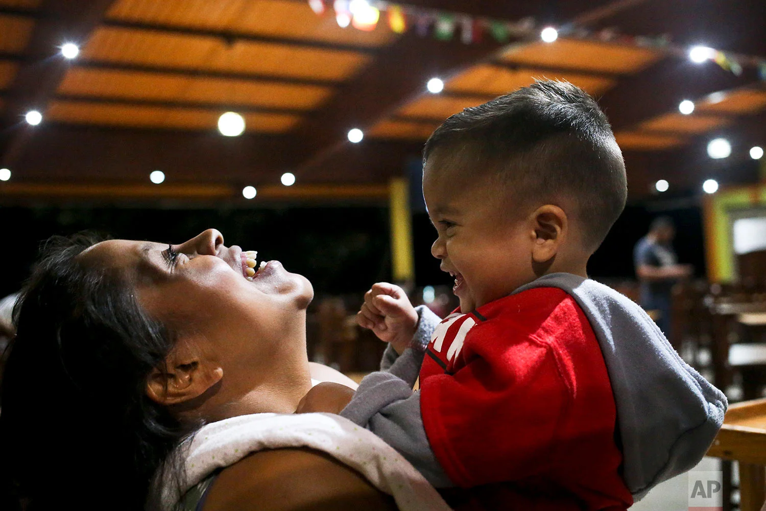Adalicia Montecinos holds her 1-year-old son Johan, who became a poster child for the U.S. policy of separating immigrants and their children, in Yojoa, Honduras, July 20, 2018. Johan arrived in San Pedro Sula and was reunited with his parents. Capt