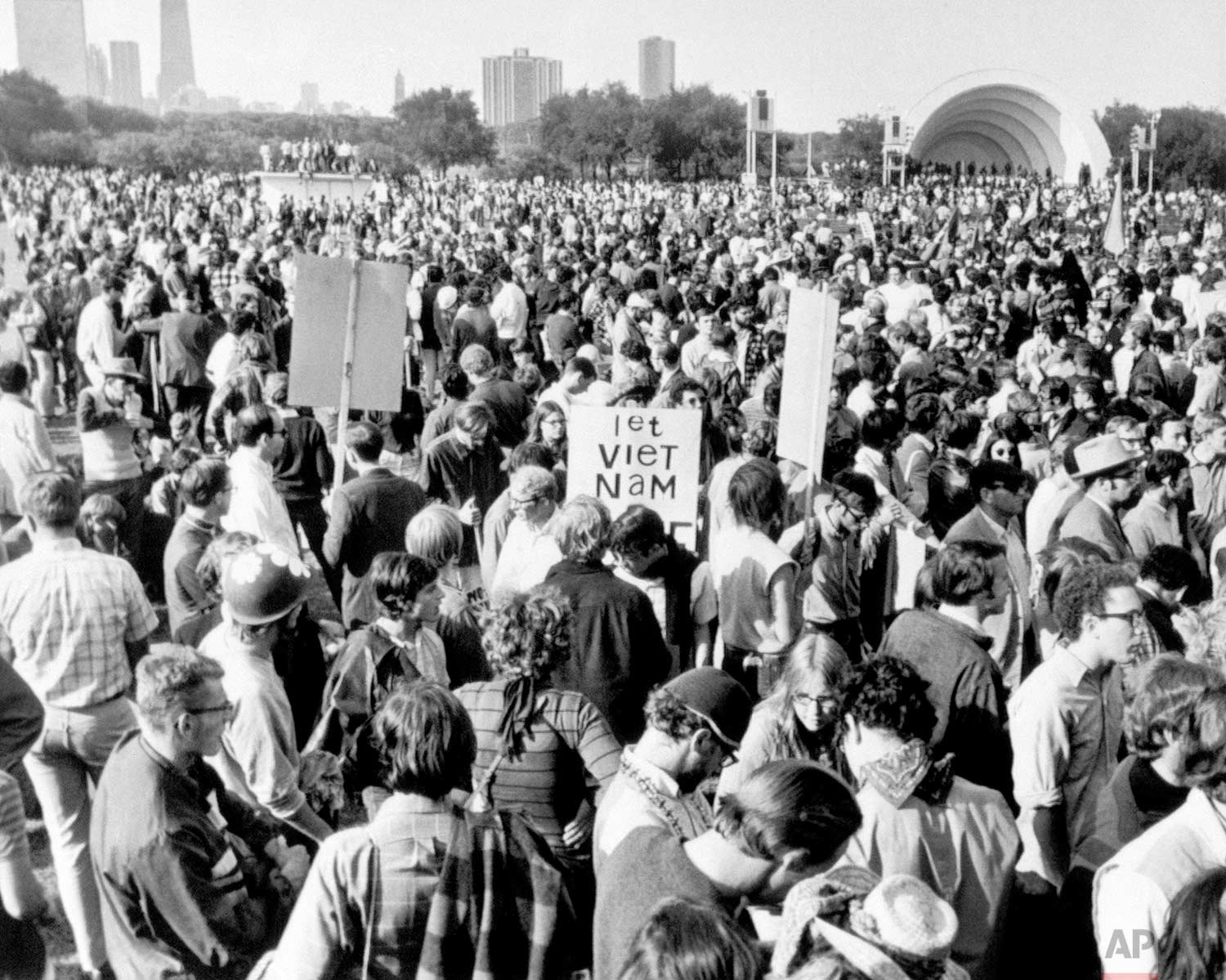 An estimated 9000 anti-war demonstrators gather in Chicago’s Grant Park on August 28, 1968, with the announced intention of marching on the site of the Democratic National Convention, the International Amphitheater. Police, who had warned the march would not be permitted, moved into the middle of the crowd swinging clubs and were showered with rocks, bottles and trash in return. (AP Photo)
