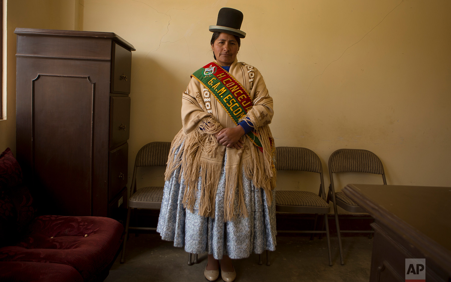 In this June 30, 2018 photo, Escoma Councilwoman Marcela Huanca, pose for a photo wearing her official sash, in Escoma, Bolivia. (AP Photo/Juan Karita) 