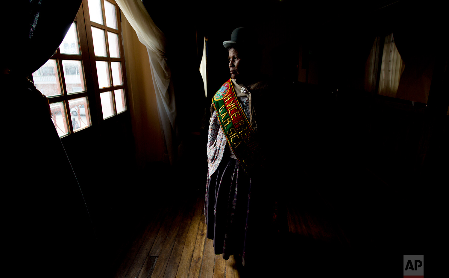  In this July 18, 2018 photo, Sica Sica Councilwoman Damiana Condori, who said she gave up her position due to harassment from the male alternate, poses for a photo in Sica Sica, Bolivia. (AP Photo/Juan Karita) 