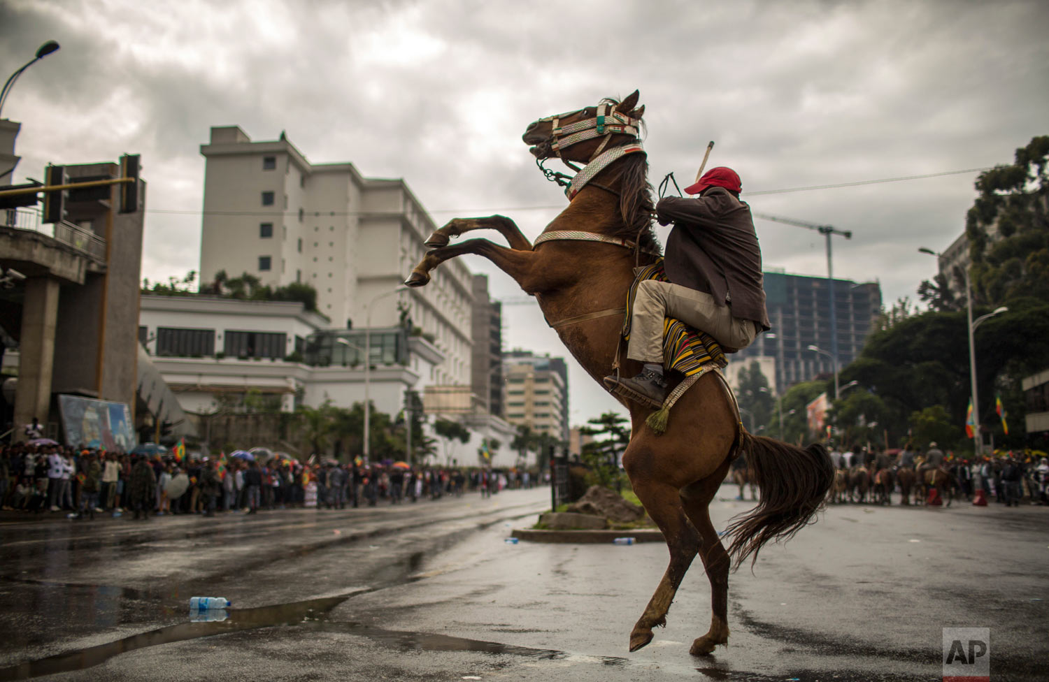  A man rides a rearing horse as hundreds of thousands gather to welcome returning leaders of the once-banned Oromo Liberation Front (OLF) in the capital Addis Ababa, Ethiopia on Saturday, Sept. 15, 2018. The OLF and two other organizations were remov