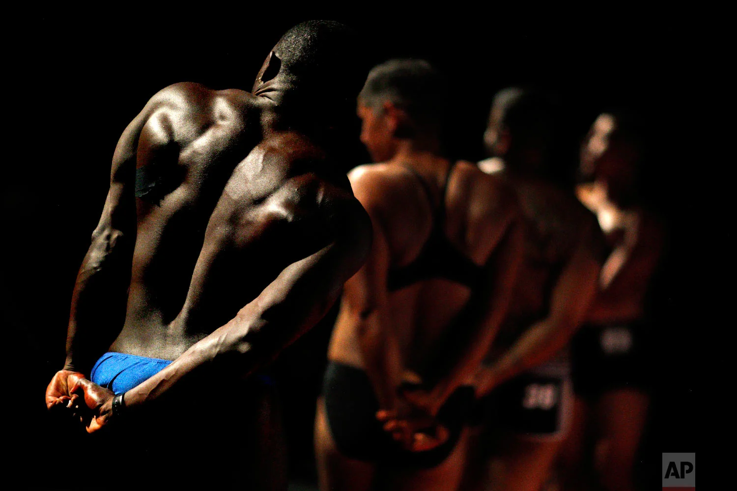 Wes Phills, of Brooklyn, N.Y., competes in the International Association of Trans Bodybuilders competition in Atlanta, Oct. 6, 2018. (AP Photo/David Goldman)