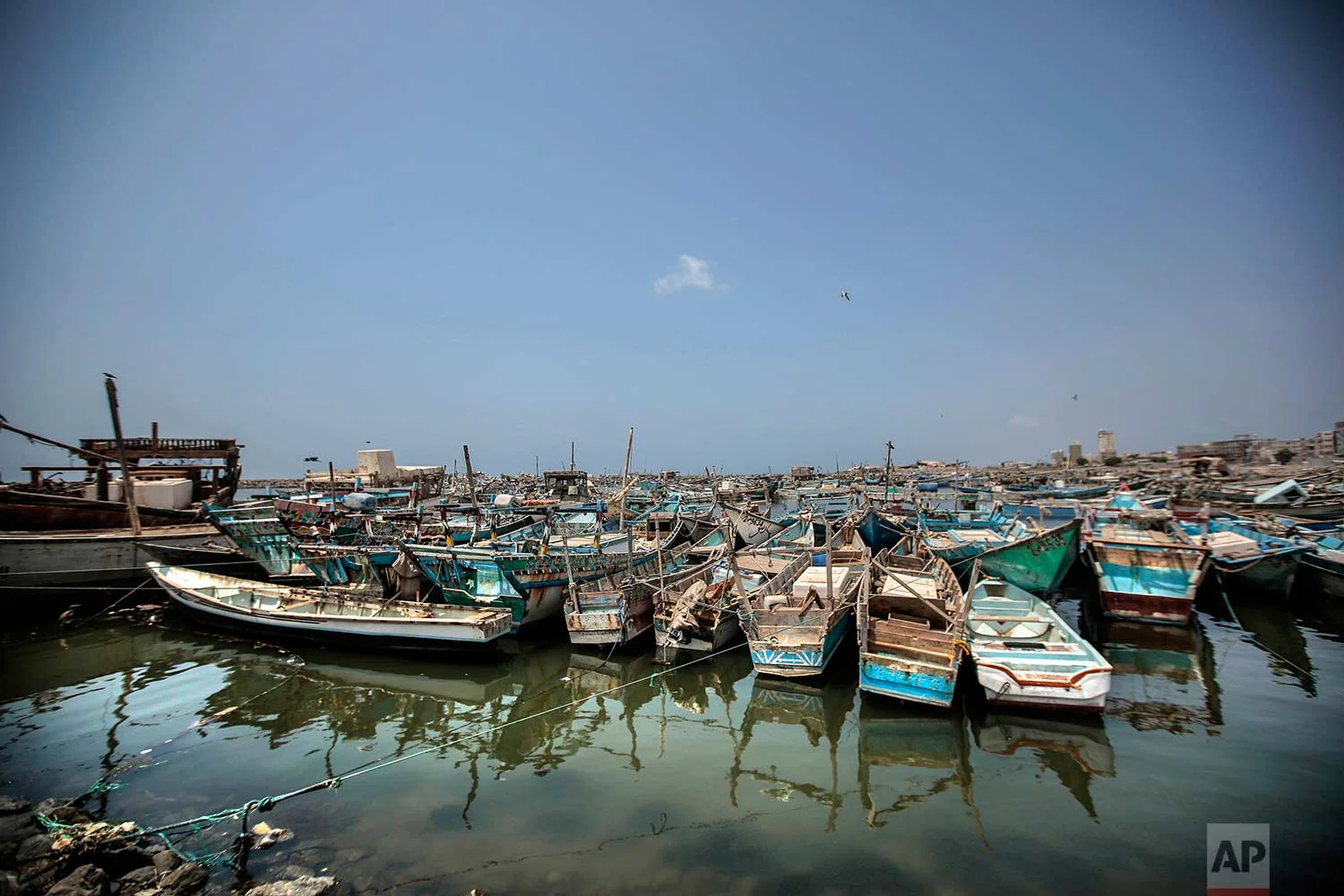 This Sept. 29, 2018, photo, shows fishing boats docked at the main fishing port, in Hodeida, Yemen. (AP Photo/Hani Mohammed)