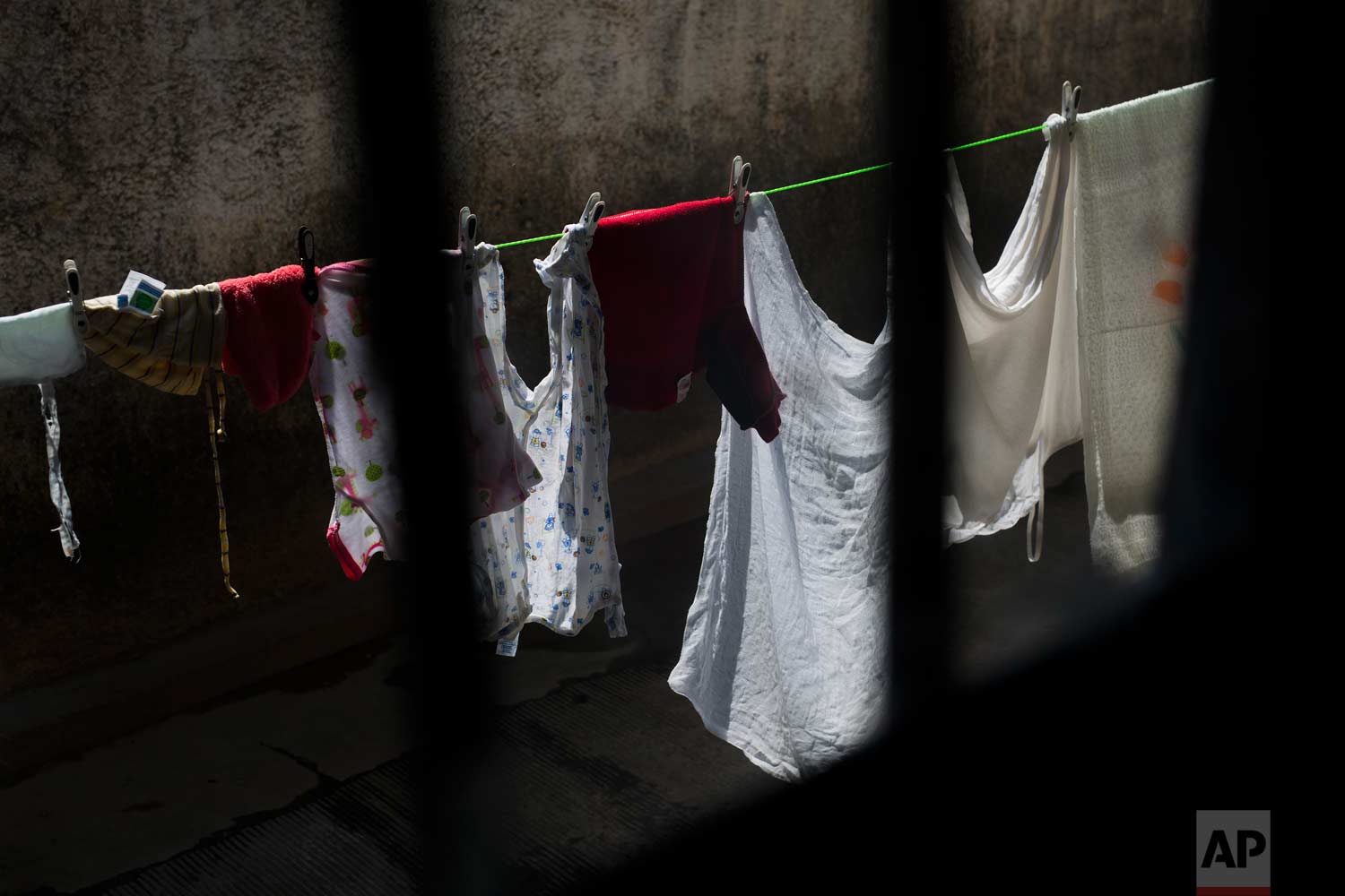 This Tuesday, Aug. 14, 2018 photo shows laundry hanging to dry outside a room used as a maternity ward at the Masaidiano Health Center in Lubumbashi, Democratic Republic of the Congo. An Associated Press investigation found that of more than 20 hosp