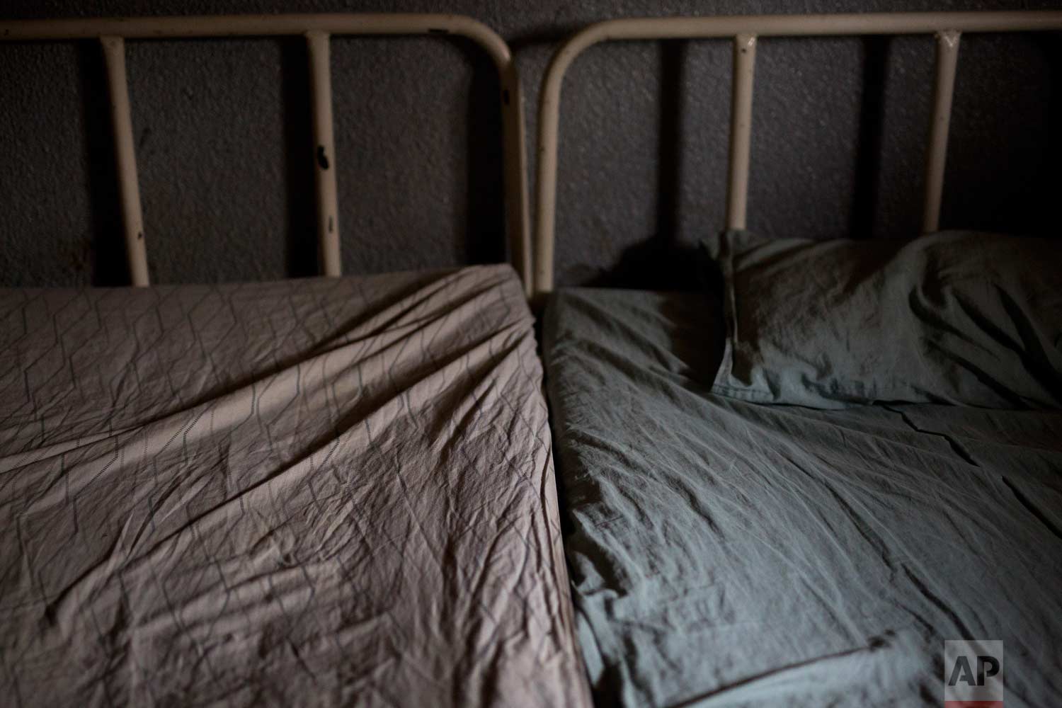  This Tuesday, Aug. 14, 2018 photo shows hospital beds at the Masaidiano Health Center in Lubumbashi, Democratic Republic of the Congo. Many hospitals lack running water and regular electricity and bed shortages are often so severe that two patients 