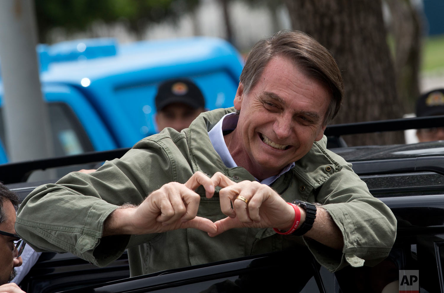  Jair Bolsonaro, presidential candidate with the Social Liberal Party, gestures after voting in the presidential runoff election in Rio de Janeiro, Brazil, Oct. 28, 2018. The right-leaning Bolsonaro ran running leftist candidate Fernando Haddad of th