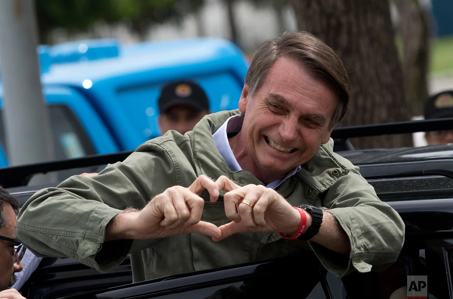 Jair Bolsonaro, presidential candidate with the Social Liberal Party, gestures after voting in the presidential runoff election in Rio de Janeiro, Brazil, Oct. 28, 2018. The right-leaning Bolsonaro ran running leftist candidate Fernando Haddad of the Workers’ Party and won. (AP Photo/Silvia izquierdo)
