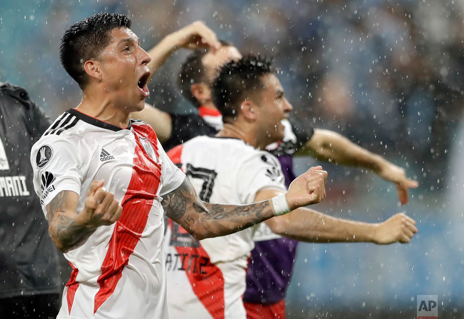 Argentina's River Plate players celebrate defeating Brazil's Gremio at a Copa Libertadores semifinal second leg match in Porto Alegre, Brazil, Oct. 30, 2018. River advances to the finals. (AP Photo/Andre Penner)