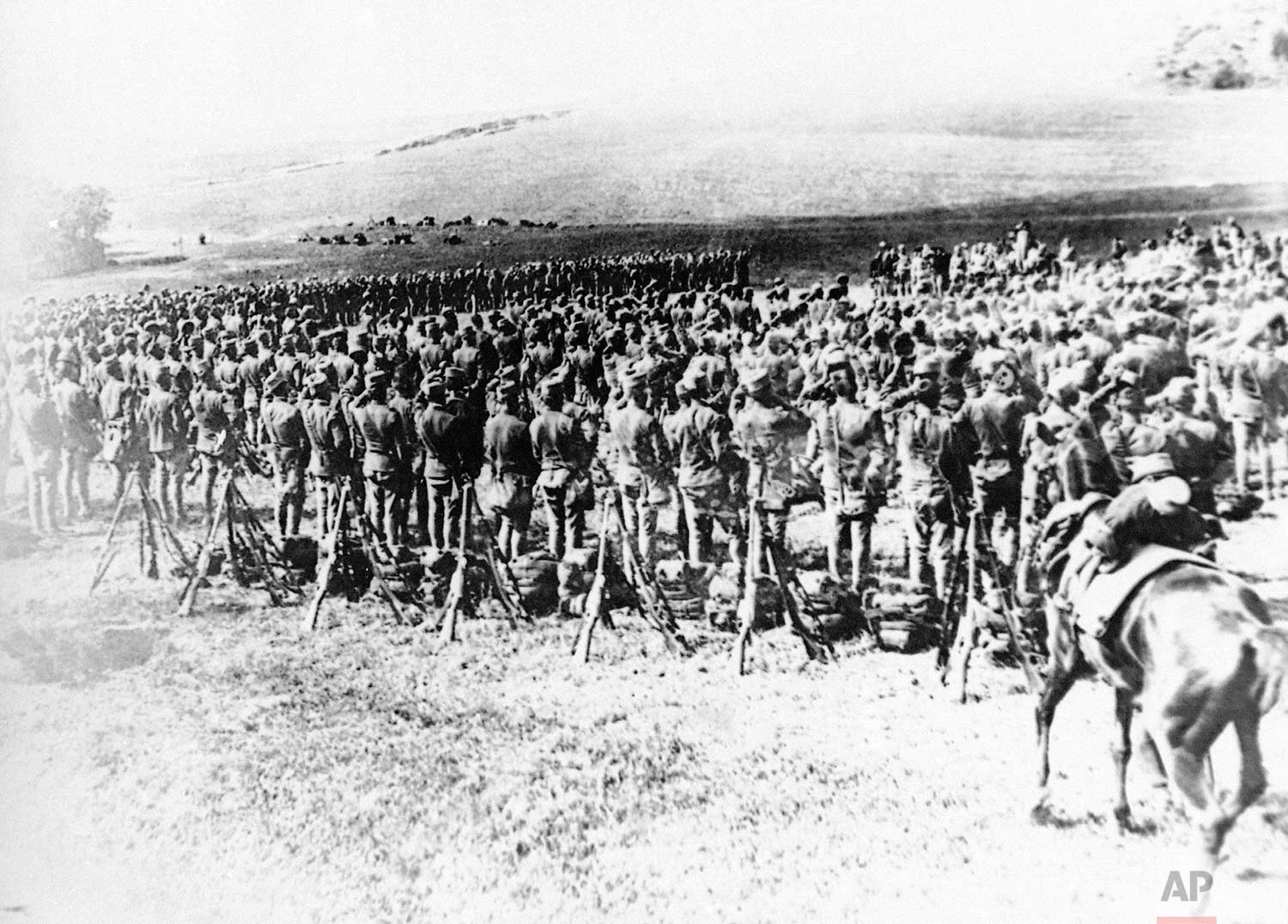  In this undated photo, troops are mobilized on the bank of the Danube River across from Belgrade during World War One. Austrian forces captured the Serbian capitol on Oct. 9, 1915. (AP Photo)
 