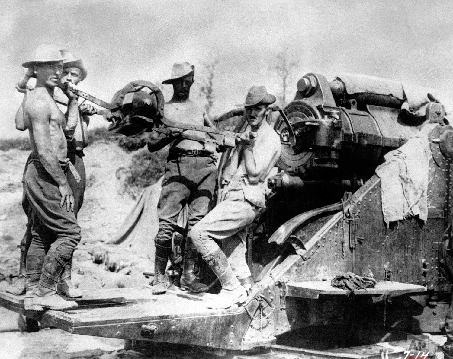  In this 1916 photo, Australian artillery soldiers operate a large caliber gun at the Somme front, in France during World War One. (AP Photo) 