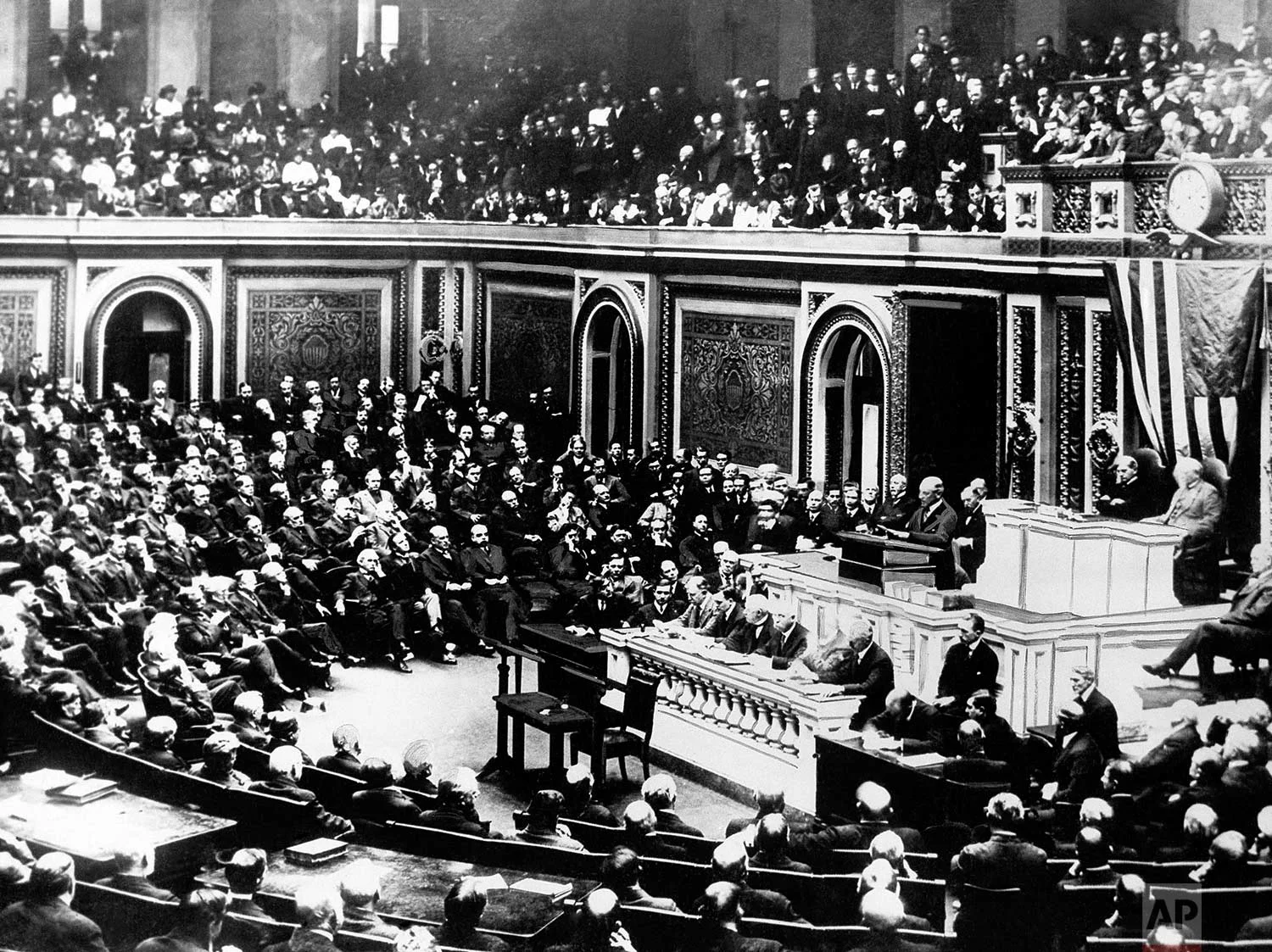 In this April 2, 1917 photo, President Woodrow Wilson delivers a speech to the joint session of Congress, in Washington, United States, during World War One. (AP Photo)