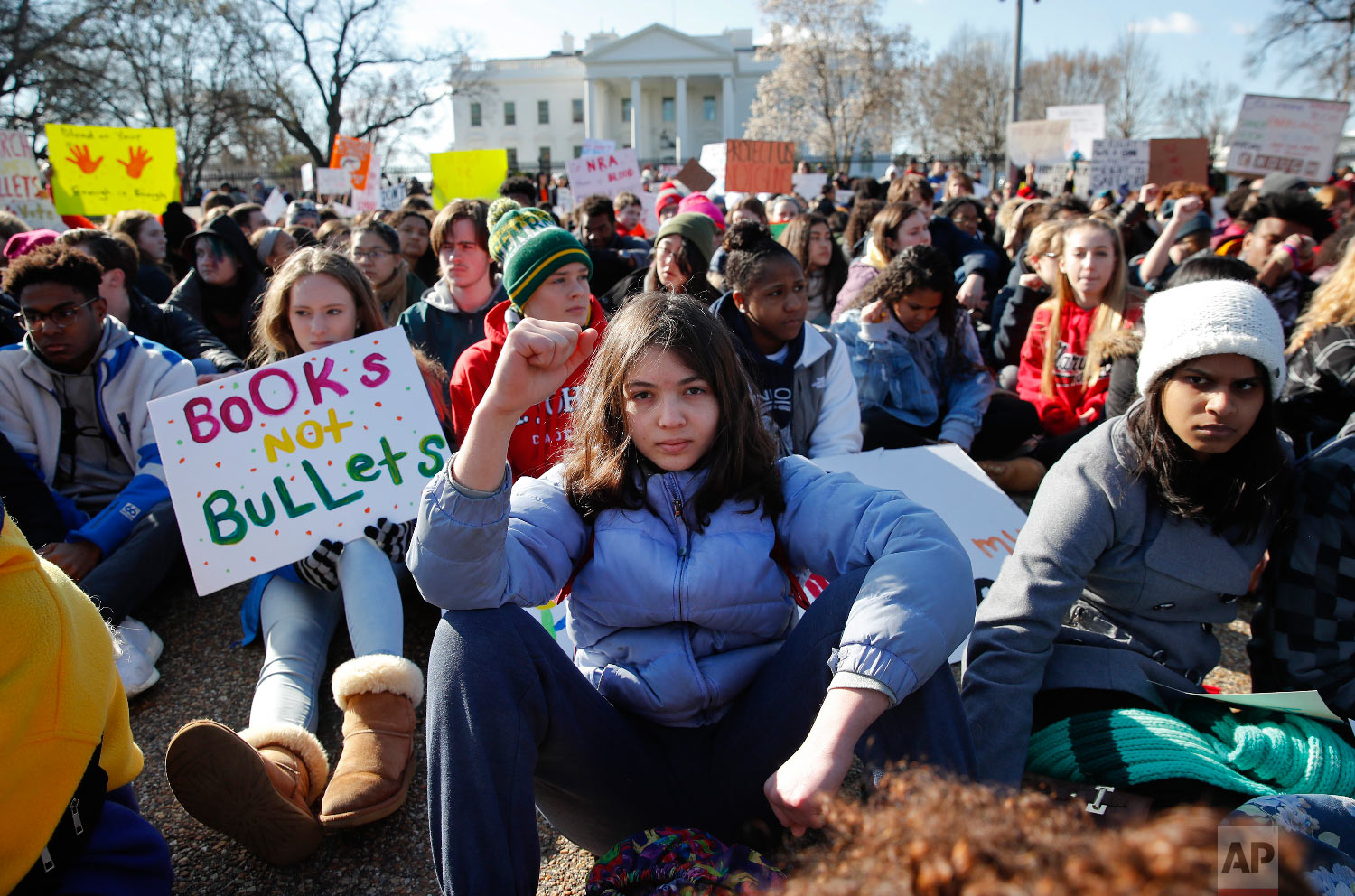  Students who walked out of school to protest gun violence participate in a demonstration in front of the White House in Washington on March 14, 2018. The protest was in response to the massacre of 17 people at Florida's Marjory Stoneman Douglas High