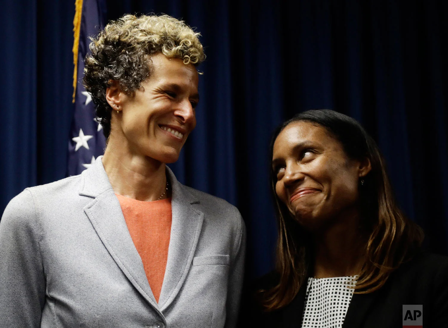 Accuser Andrea Constand, left, reacts at a news conference with prosecutor Kristen Feden after Bill Cosby was sentenced to three to 10 years for sexual assault on Sept. 25, 2018, in Norristown, Pa. (AP Photo/Matt Slocum)