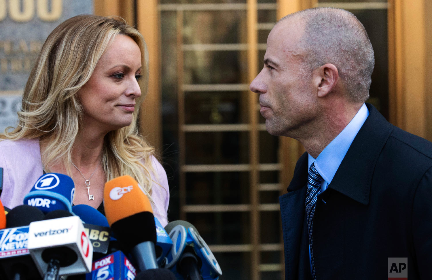 Adult film actress Stormy Daniels, left, stands with her lawyer, Michael Avenatti, after speaking outside federal court in New York on April 16, 2018. (AP Photo/Mary Altaffer) 
