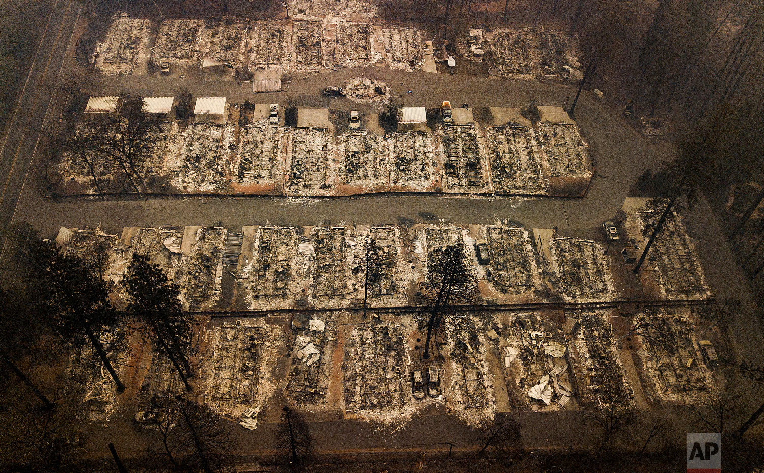  Ashes and debris are all that remain where houses once stood in Paradise, Calif., on Nov. 15, 2018, after a wildfire destroyed the town. (AP Photo/Noah Berger) 