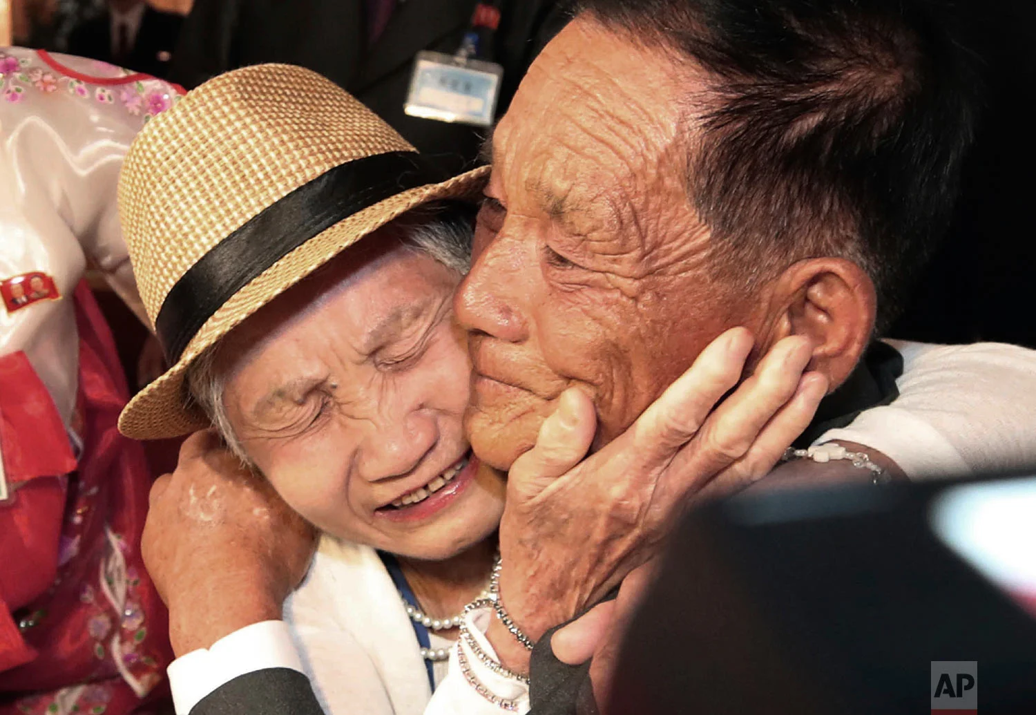 South Korean Lee Keum-seom, 92, weeps with her North Korean son, Ri Sang Chol, 71, during the Separated Family Reunion Meeting at the Diamond Mountain resort in North Korea on Aug. 20, 2018. Dozens of elderly South Koreans crossed the heavily fortified border into North Korea for heart-wrenching meetings with relatives most haven't seen since they were separated by the turmoil of the Korean War. (Lee Ji-eun/Yonhap via AP)