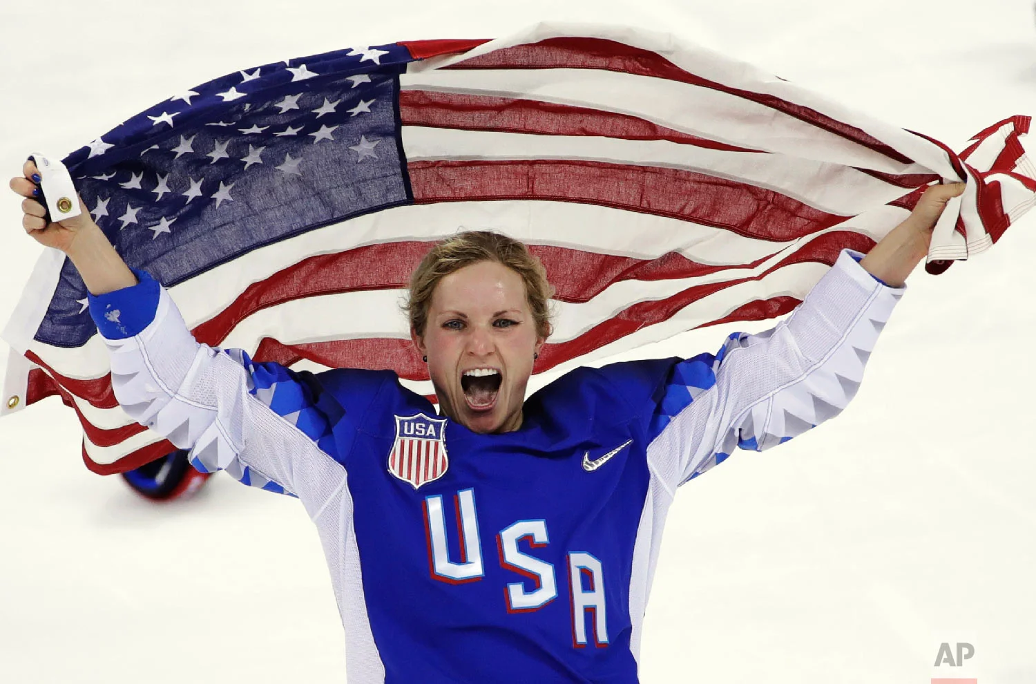 Jocelyne Lamoureux-Davidson, of the United States, celebrates after winning against Canada in the women's gold medal hockey game at the 2018 Winter Olympics in Gangneung, South Korea, on Feb. 22, 2018. (AP Photo/Matt Slocum)