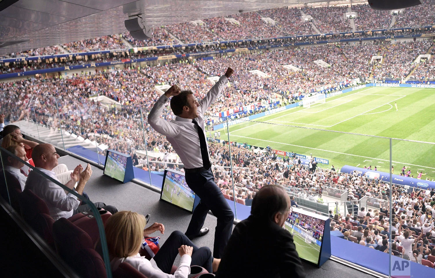 French President Emmanuel Macron cheers during the final match between France and Croatia at the 2018 soccer World Cup in the Luzhniki Stadium in Moscow, Russia, on July 15, 2018. (Alexei Nikolsky/Sputnik/Kremlin Pool Photo via AP)